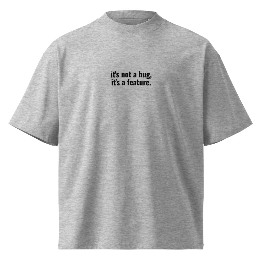 "IT'S NOT A BUG, IT'S A FEATURE." Oversized Tee - Light The Developer Shop